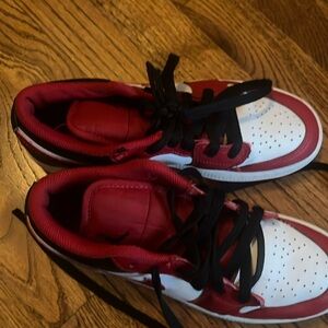 Red, black, and white Jordan low